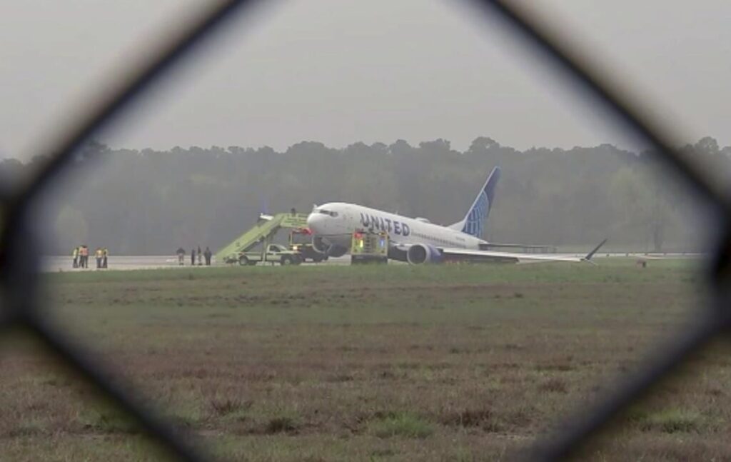 United Airlines Plane Falls Off Runway In Houston